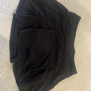 Black pleated lulu shirt. No tag. Worn but in great condition.